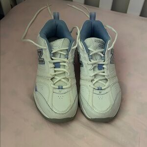New Balance womens White and Light Blue Sneakers